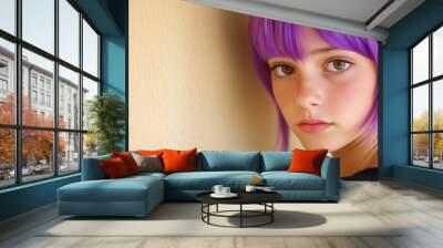 Thoughtful teenager with purple hair leaning against a wall in a softly lit room Wall mural