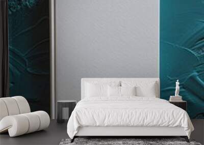 Vertical white book on a textured teal background Wall mural