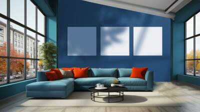 3 square posters on the wall with overlay shadow. Classic Blue color. Color of the year 2020. Wall mural