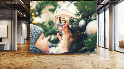 Happy family spend time at a Christmas and New Year holidays Wall mural