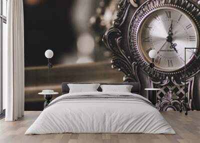 Vintage background with retro alarm clock on table Wall mural