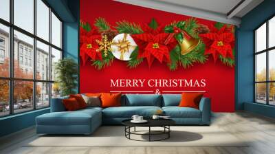 Christmas border decorations garland with Christmas flowers poinsettia, golden bells, fir branches, holly berries and gifts boxes. Design element for Xmas and New Year card on red background. Wall mural