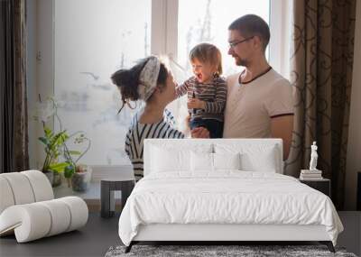 happy family with  son kid toddler playing near window real inte Wall mural