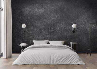 Black empty chalk board with two pieces of chalk. Copyspace. Back to school concept. Wall mural