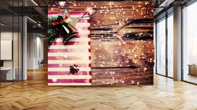 Christmas Present wrapped in red paper on a wooden background wi Wall mural