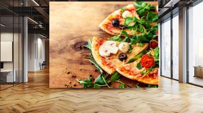 Hot pizza slice with Pepperoni, tomatoes, melting cheese on a rustic wooden table close up. Copy space. Wall mural