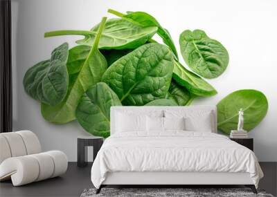 Pile of fresh green baby spinach leaves isolated  on white background. Close up Wall mural