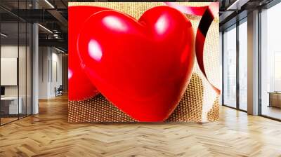 Two Red Hearts on golden plate close up. Valentines Day backgrou Wall mural