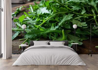 Arugula lies on the table close-up. Concept postcard, copy space, lifestyle, food, nutrition, health, vitamins,gardener, farmer, Wall mural