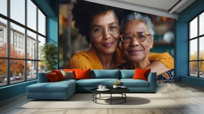 Hispanic and African American women sitting together at a senior center Wall mural