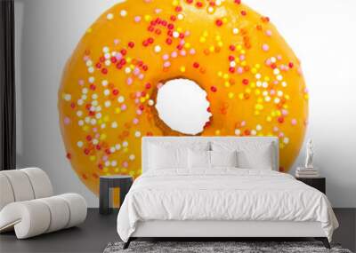 Donut with orange glaze and colorful sprinkles Wall mural