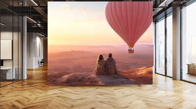 Young couple of tourists sits on mountain and, watching pink balloons. Magical landscape of Cappadocia at dawn. Generative Ai content Wall mural