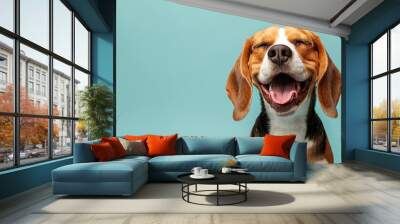 A dog is smiling and has its mouth open. The dog is brown and white. a beagle dog with its eyes closed in joy, mouth open in a carefree smile against a light blue pastel background. Wall mural