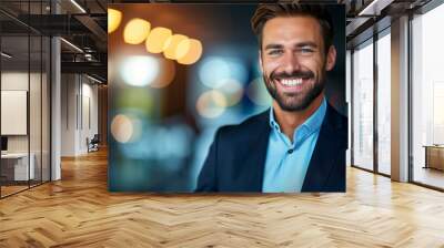 A man in a blue suit is smiling and looking at the camera. The image has a warm and friendly mood, with the man's smile and the blue color of his suit. a charismatic confident happy 30 years old ceo Wall mural