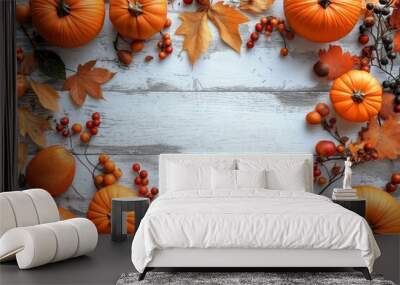 A white background with a frame of orange and white pumpkins and leaves. The pumpkins are arranged in a circle and the leaves are scattered around them. Scene is warm and inviting Wall mural