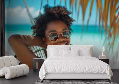 accessories, fashion, people and luxury concept - beautiful young woman in elegant black sunglasses over exotic tropical beach with palm trees background Wall mural