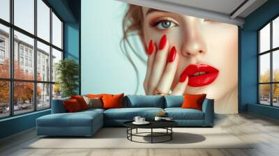 Beautiful laughing brunette model girl. Red lips and nails manicure . Fashion , beauty and make up portrait Beautiful girl showing red manicure nails . makeup and cosmetics. Studio shot of young beaut Wall mural