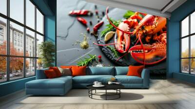 Boiled lobster with vegetables on a black stone plate. Seafood. Top view. Free space for your text. A delicious freshly boiled lobster on plate. restaurant menu. Wall mural