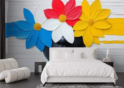 Woman's face is painted with flowers. The flowers are blue, white, and yellow. The face is black. abstract colorful black female model with flower bouquet as her head Wall mural