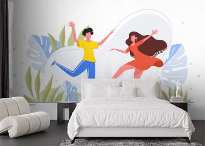 Friends dance and joy together in casual wear in the wild, forest, park. Wall mural