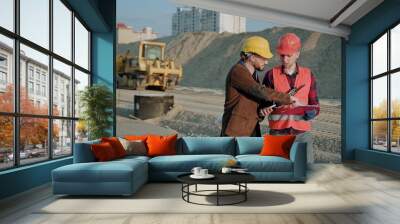 Male walking and discuss with professional builder Wall mural