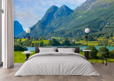 Norwegian landscape with Nordfjord fjord, summer mountains and village in Olden, Norway Wall mural