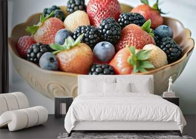 assortment of berries in a beautiful bowl Wall mural