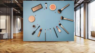 Set of female cosmetics on a blue background. Wall mural