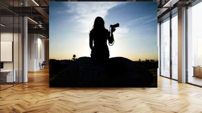 Female silhouette against the sky Wall mural