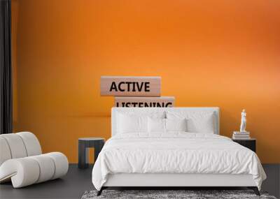 Active listening symbol. Wooden blocks with words Active listening. Beautiful orange background. Business and Active listening concept. Copy space. Wall mural