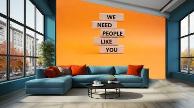 Hiring symbol. Wooden blocks with words We need People like You. Beautiful orange background. Business and Hiring concept. Copy space. Wall mural