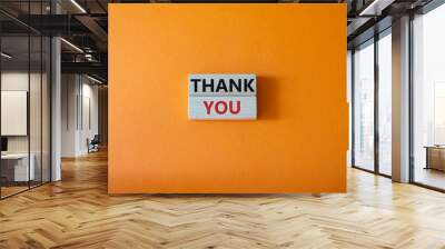 Thank you symbol. Wooden blocks with words Thank you. Beautiful orange background. Business and Thank you concept. Copy space. Wall mural