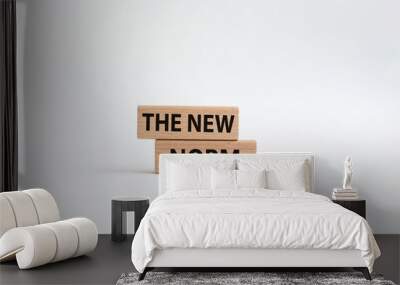 The new norm symbol. Concept words The new norm on wooden blocks. Beautiful white background. Business and The new norm concept. Copy space. Wall mural