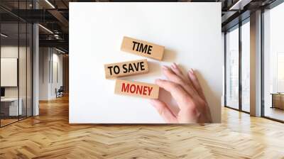 Time to save money symbol. Wooden blocks with words Time to save money. Businessman hand. Beautiful white background. Business and Time to save money concept. Copy space. Wall mural