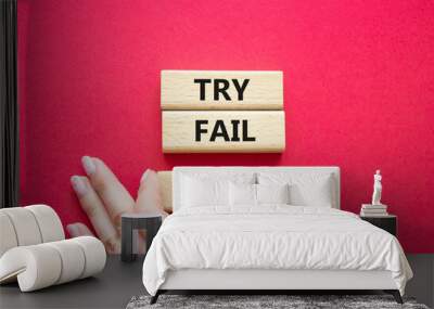 Try Fail Win symbol. Concept words Try Fail Win on wooden blocks. Beautiful red background. Businessman hand. Business and Try Fail Win concept. Copy space. Wall mural