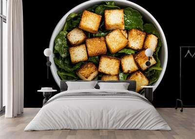 Caesar Salad with Golden Croutons and Fresh Lettuce on Black Background Wall mural