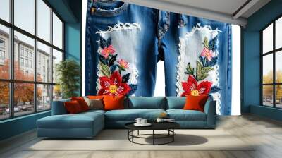 A pair of jeans with a floral design printed on the fabric, suitable for fashion photography or lifestyle shots Wall mural