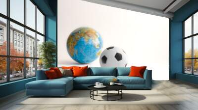 Globe and soccer ball on white background. December 10, World Football Day Wall mural