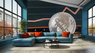 Coins of bitcoins lie on the table in front of and next to the tablet on which charts of Bitcoin's cost growth are visible. The concept of crypto currency. Wall mural