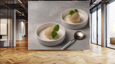 Lemon sorbet with mint leaf, refreshing ice cream, two servings of one ball Wall mural