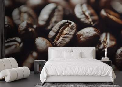 A heap of coffee beans stacked together, ready to be brewed into a delicious cup of coffee .Close-up of roasted Arabica coffee beans .Different types of delicious coffee beans Wall mural