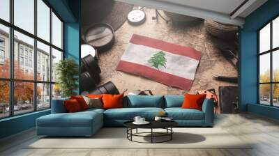 Lebanon Flag Between Traveler's Accessories on Old Vintage Map. Tourist Destination Concept. Wall mural