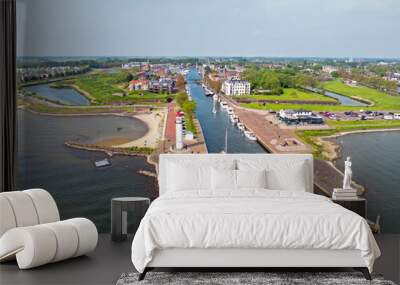 Aerial from the town Hellevoetsluis with the lighthouse in the Netherlands Wall mural