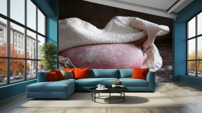 Pink beet root bread dough under cloth Wall mural