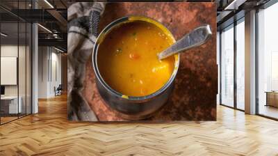 Bowl of carrot soup Wall mural