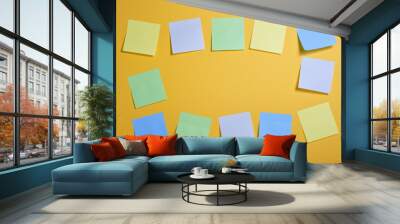 frame made of bright colored sticky notes on yellow background, copy space Wall mural