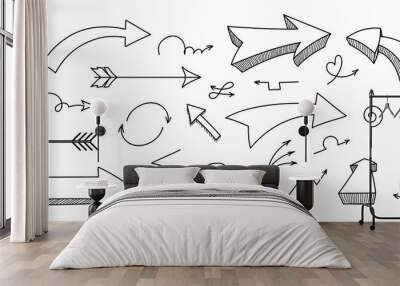 Set of hand drawn different decorative arrow. Arrow element drawn with a brush-pen. Isolated vector. Wall mural