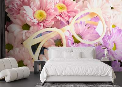 trendy plastic eye glasses and flowers, fashion eyewear conccept Wall mural