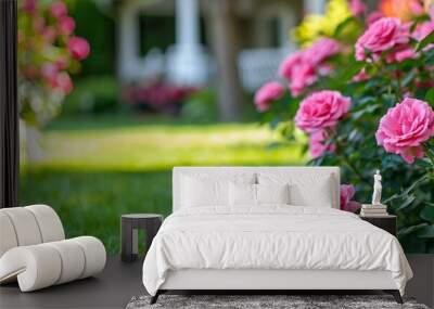 Garden in beautiful yard with pink roses and green grass Wall mural