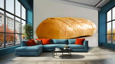 a loaf of wheat flour lies on the table. Wall mural